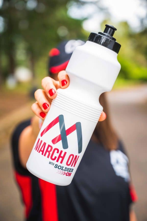 White drink bottle with a black lid. It has the March On with Soldier On logo in dark grey and red.